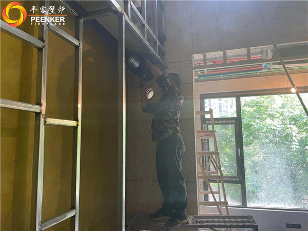 陜西西安曲江華著中城丹麥Aduro A5真火壁爐安裝.jpg