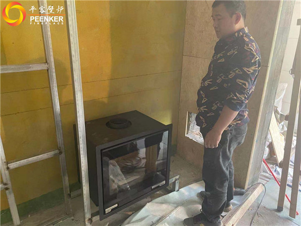 陜西西安曲江華著中城丹麥Aduro A5真火壁爐安裝.jpg