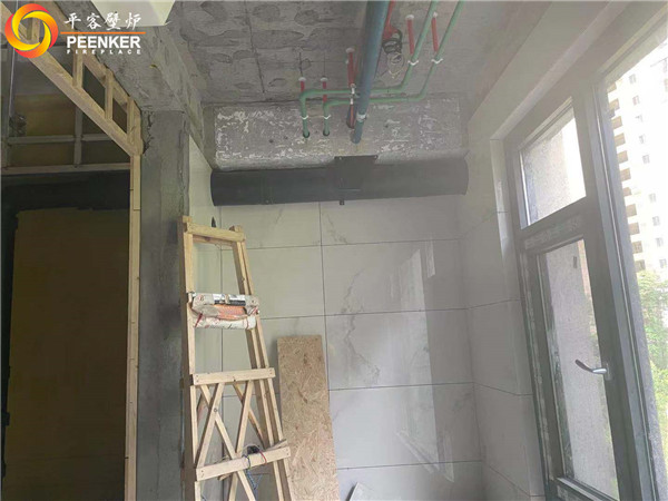 陜西西安曲江華著中城丹麥Aduro A5真火壁爐安裝.jpg